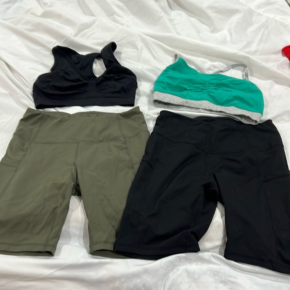 2 pairs medium bike shorts and 2 small, unlined sports bras